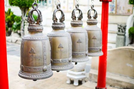 This is the old bell at Arun Temple in Thailandの写真素材