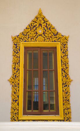 The window on the wall of temple.の写真素材