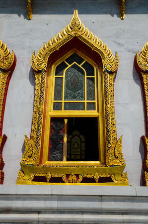 Window on the wall of benchamabophit temple.の写真素材
