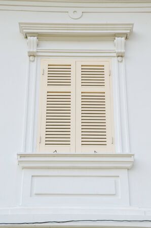 White door at benchamabophit temple.の写真素材