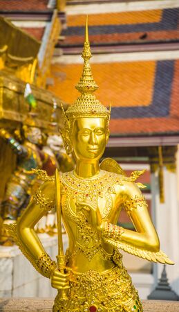Gold staue in emerald temple.