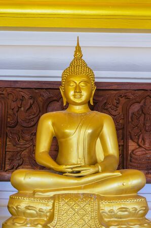 Gold staue monk at the temple.の写真素材