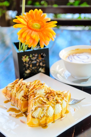 Caramel waffle on the wood table.の写真素材
