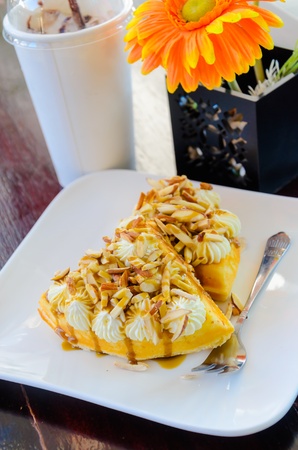 Caramel waffle on the wood table.の写真素材