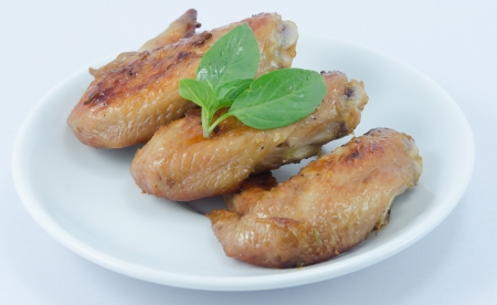 Grill chicken on white backgrounds.の写真素材