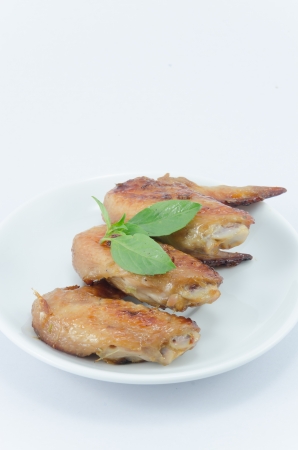 Grill chicken on white backgrounds.の写真素材