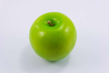 Fake apple on white backgrounds.の写真素材