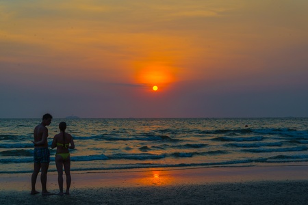 People on the beach in twilight time at pattaya province (Thailand)の写真素材