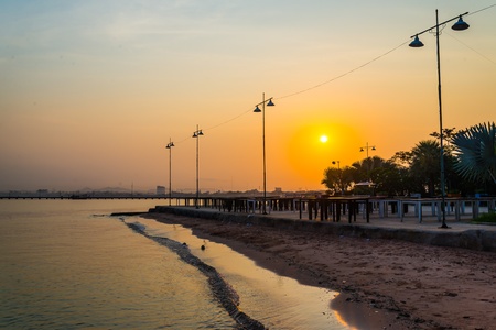 Sunset on the beach in pattaya province.の写真素材