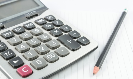 Calculater on white paperの写真素材