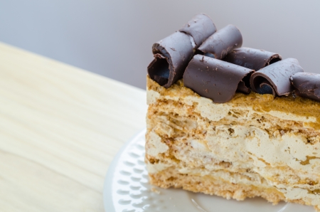 Coffee cake in white dish on the wood table