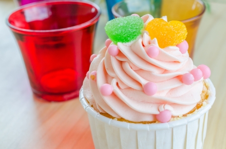 Strawberry cupcake on wood tableの写真素材