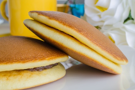 Pancake in white dish on the wood tableの写真素材