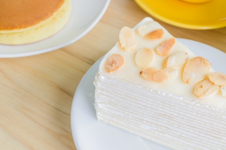Crepe cake on white dishの写真素材