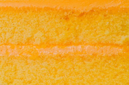 Orange Cake in white dish on the wood table