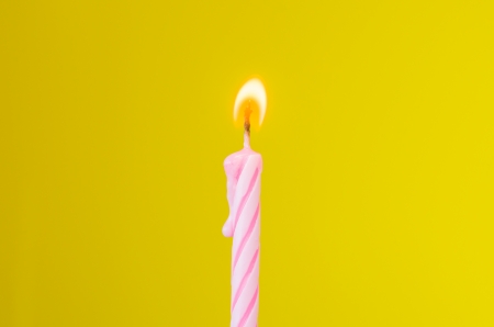 Candle with color background for wallpaperの写真素材