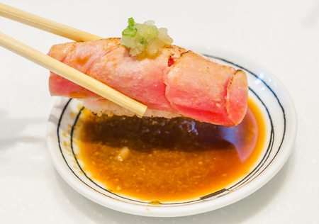 Grill tuna sushi in white dishの写真素材