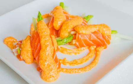 Salmon roll in white dishの写真素材