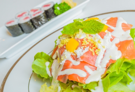 Salad salmon in white dishの写真素材