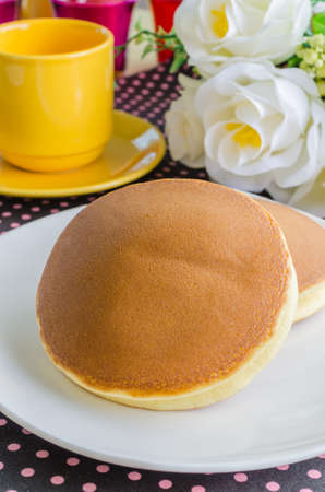 Pancakes on white dishの写真素材