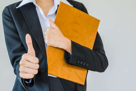 business woman showing thumbs upの写真素材