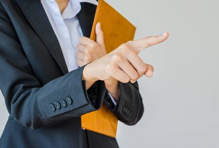 Business women point finger