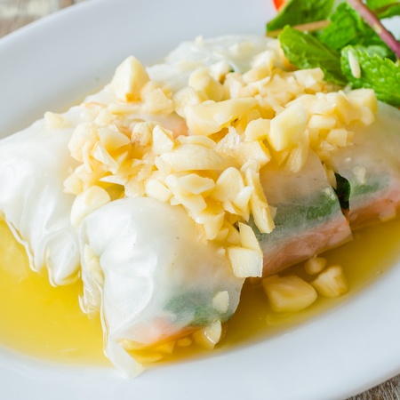 spring rolls with garlic and lemon sauceの写真素材
