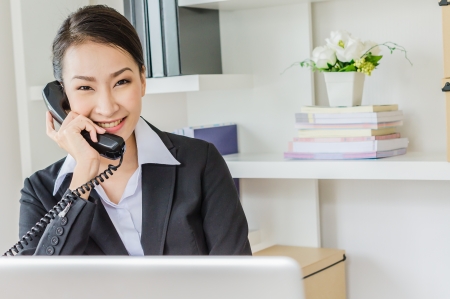 Young business women phone callingの写真素材