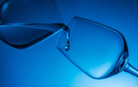 Water splash with wine glassの写真素材