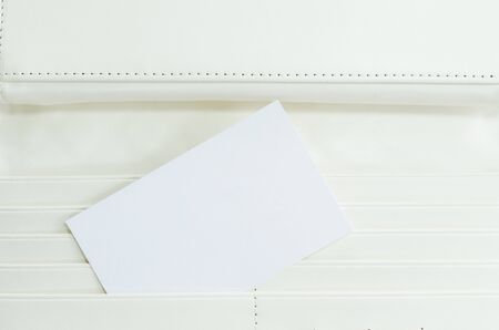 Surface white leather wallet with note