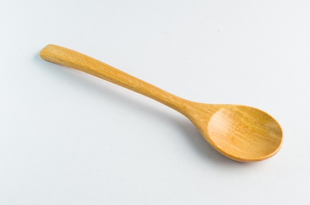 Wood spoon on white backgroundの写真素材