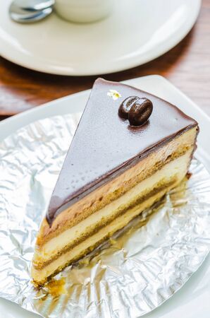 Coffee cake on wood tableの写真素材