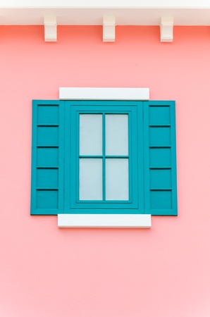 Beautiful window on color wallの写真素材