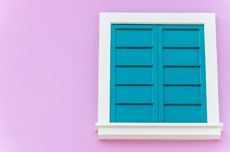 Beautiful window on color wallの写真素材