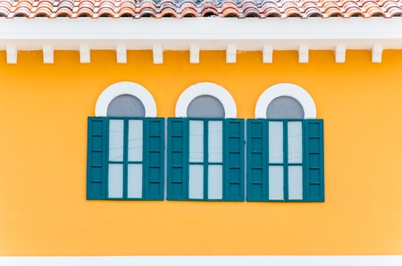 Beautiful window on color wallの写真素材