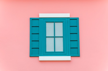 Beautiful window on color wallの写真素材