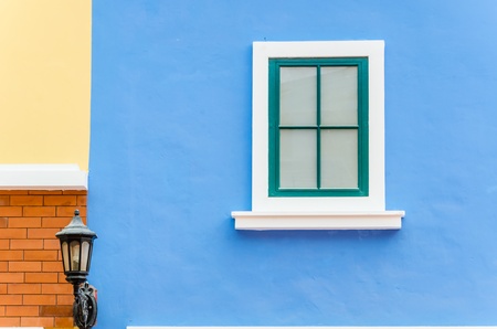Beautiful window on color wallの写真素材