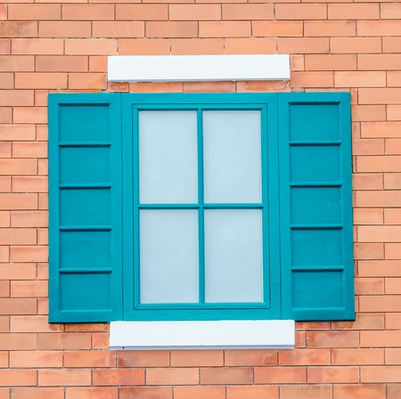Beautiful window on color wallの写真素材