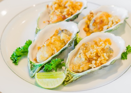 Oyster fried with garlicの写真素材