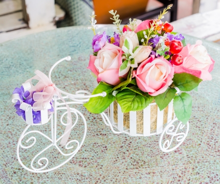 Fake flower on bicycle vaseの写真素材