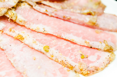 Raw meat pork in white dishの写真素材