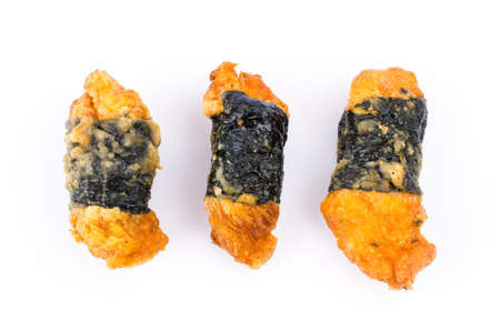 Chicken roll and seaweed isolated on whiteの写真素材