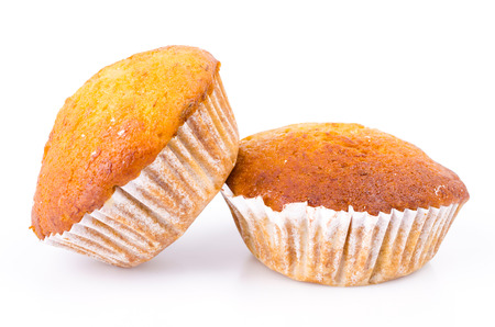 Banana cupcake isolated on whiteの写真素材