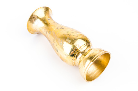 Brass old vase isolated on whiteの写真素材