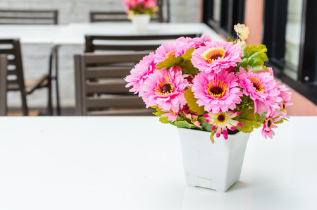 Fake flowers in vaseの写真素材