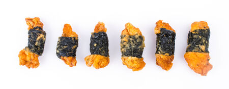 Chicken roll and seaweed on white backgroundの写真素材