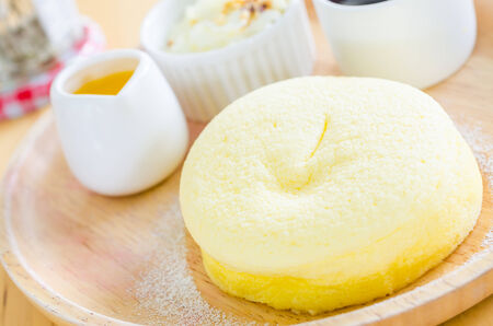 Pudding cheese dessert   with wip cream and blueberry toppingの写真素材