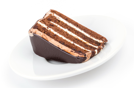 Chocolate cake on isolated white backgroundの写真素材