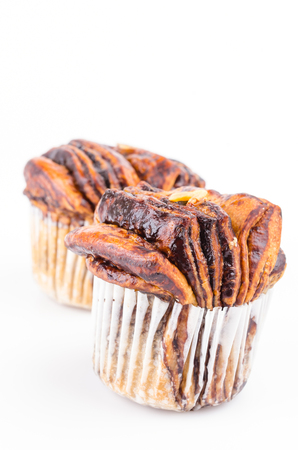 Chocolate cupcake on isolated white の写真素材
