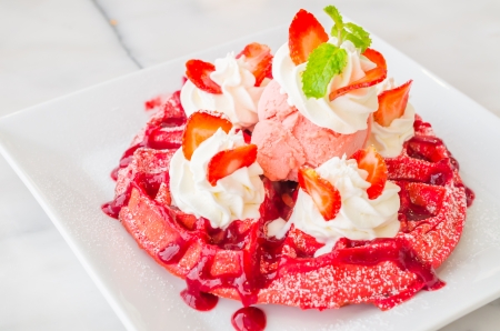 Strawberry waffle served with icecreamの写真素材